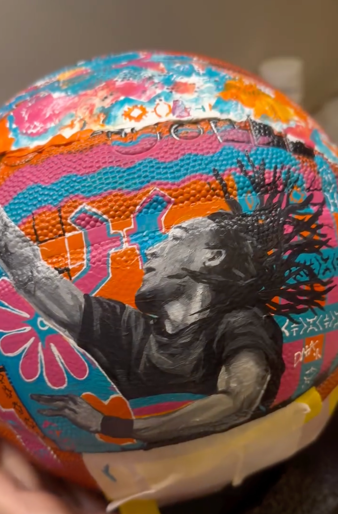 Colorful hand-painted football portrait by DNA Paint