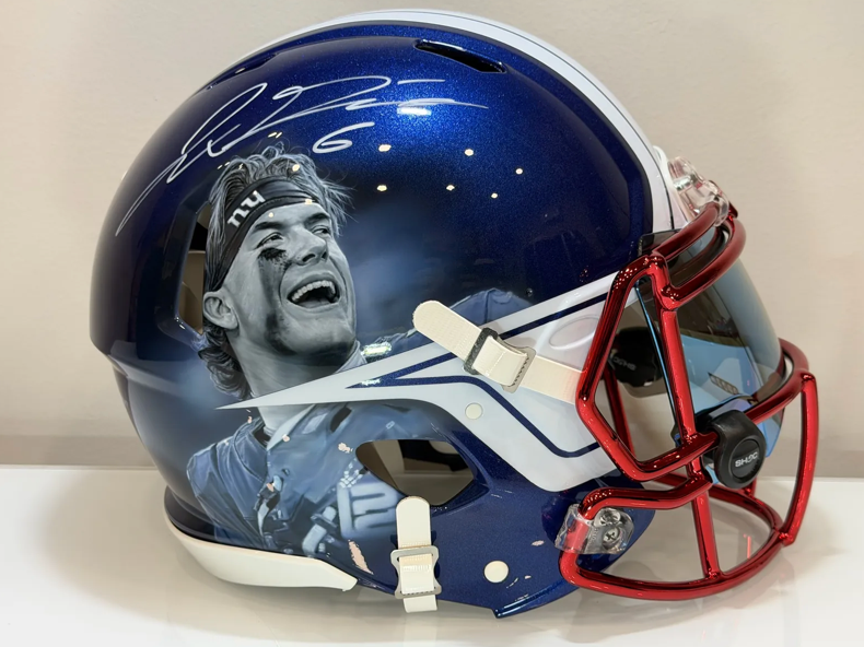Custom New York Giants helmet with a detailed player portrait by Eden’s Oasis