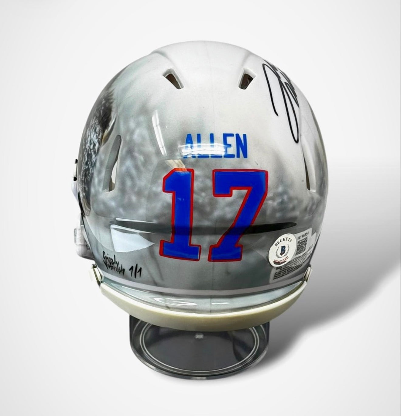 Rear of a Josh Allen helmet with Grizzly Airbrush artist signature and 1/1 marking