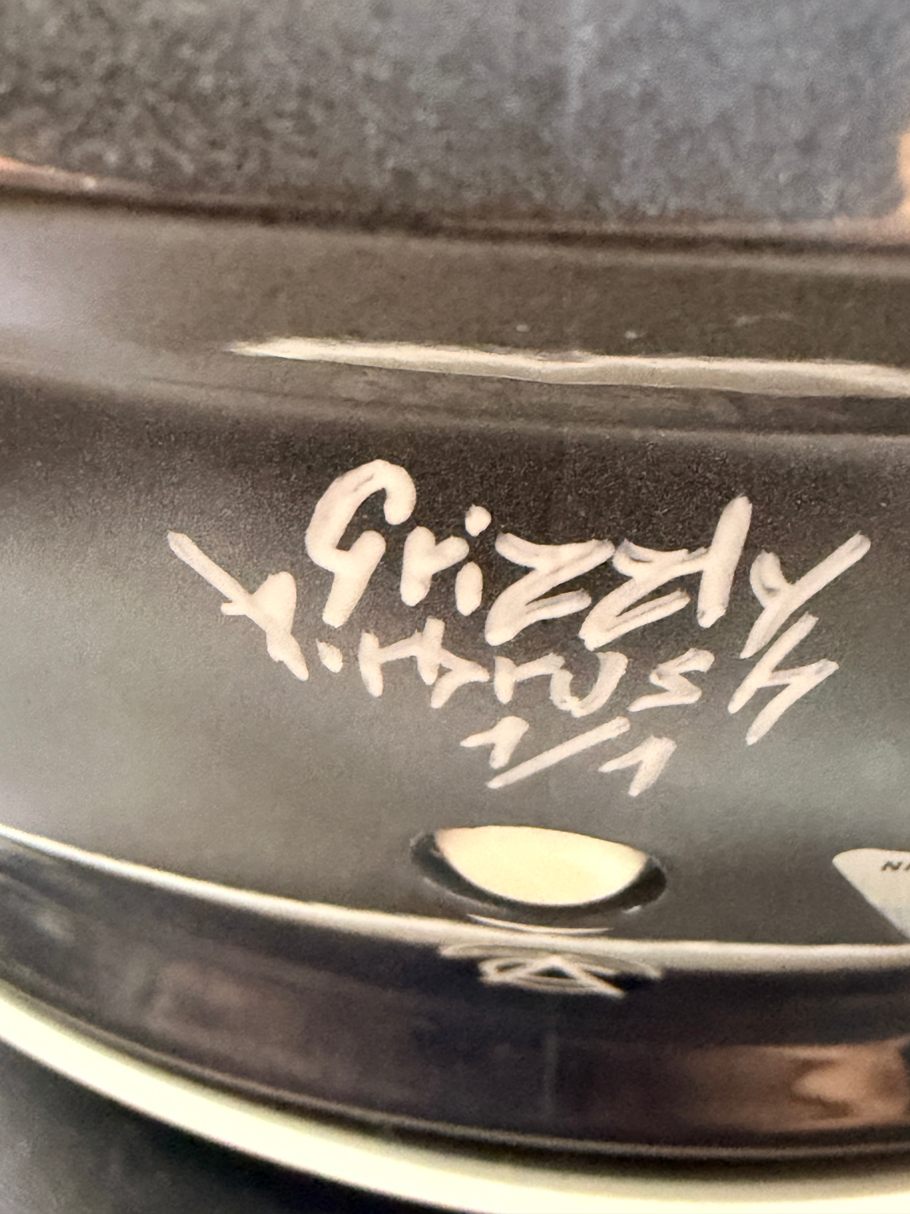 Grizzly Airbrush signature and 1/1 marking on the helmet