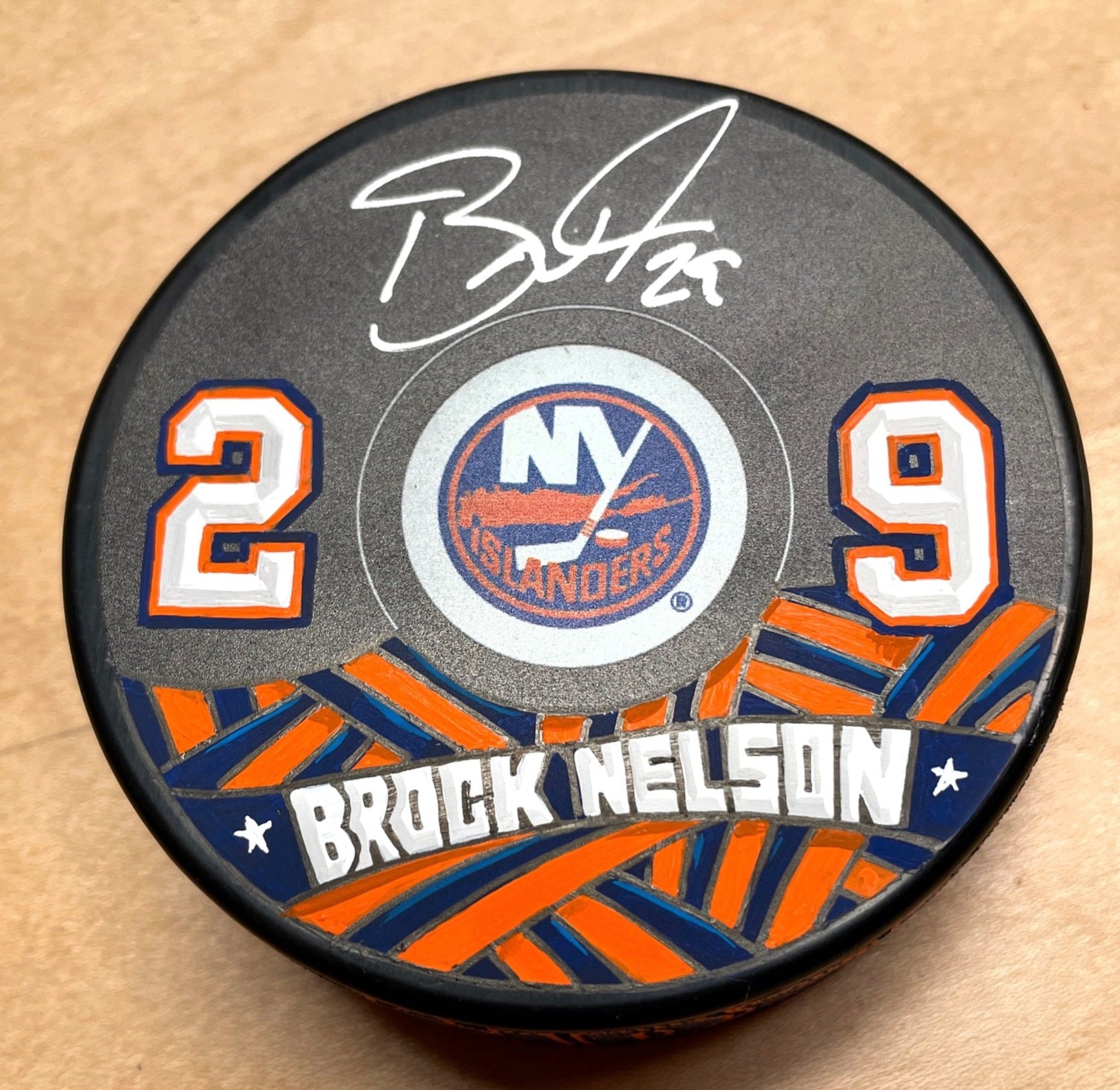 Custom New York Islanders Brock Nelson puck painted by Mike Floyd