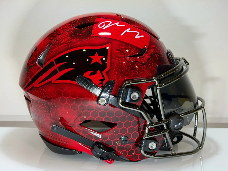 Red custom New England Patriots helmet by Psychotic Air Customs