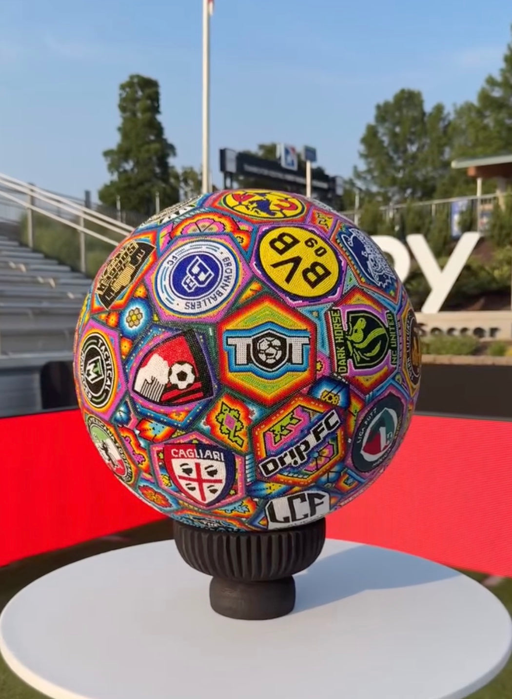 Colorful hand-beaded soccer ball by Soul Made Arte